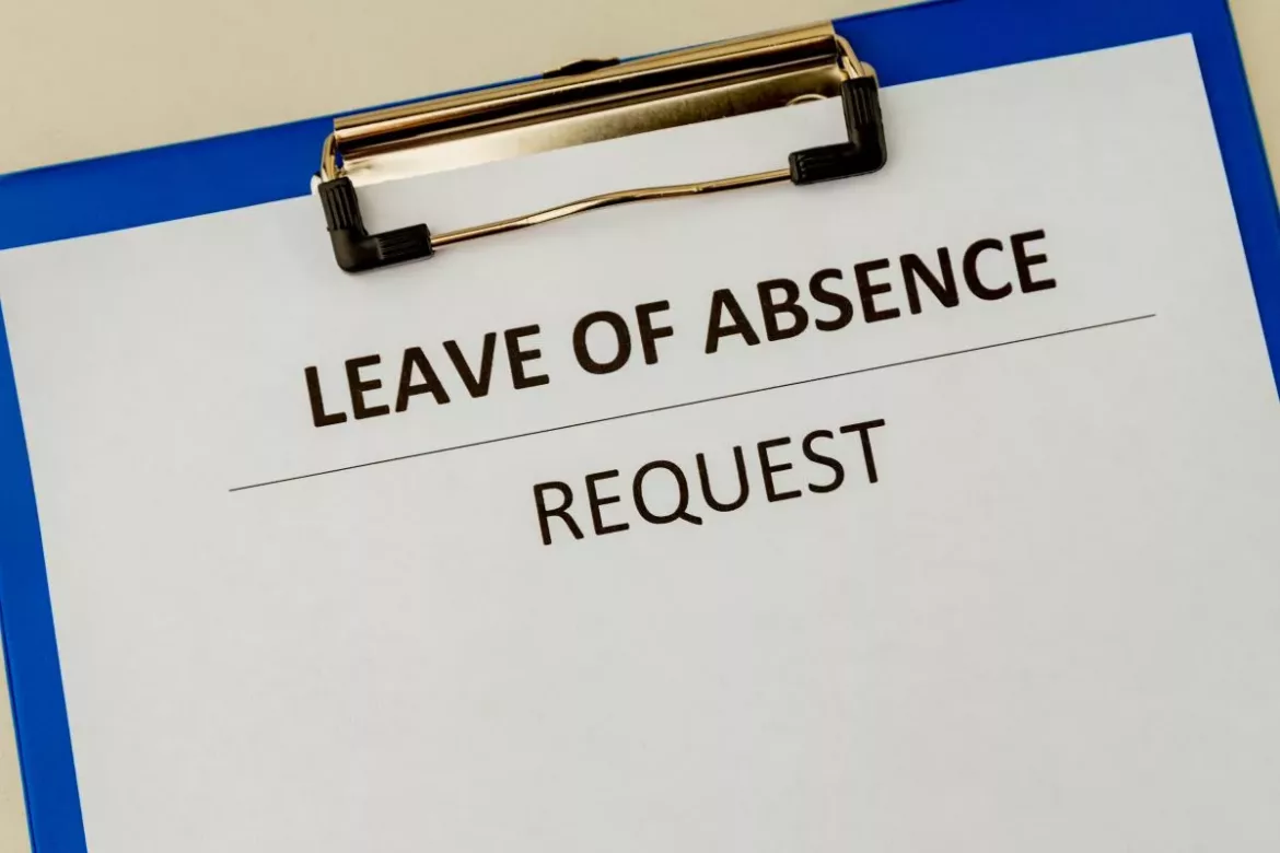 Leave of Absence form attached to clipboard