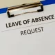 Leave of Absence form attached to clipboard